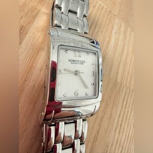 Kenneth Cole reaction ladies rectangular silver tone watch NEW BATTERY
